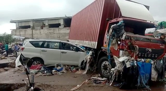 A car collided with a truck after a road caved-in following incessant rainfall, at Gaganpahad-Shamshabad road near Hyderabad.