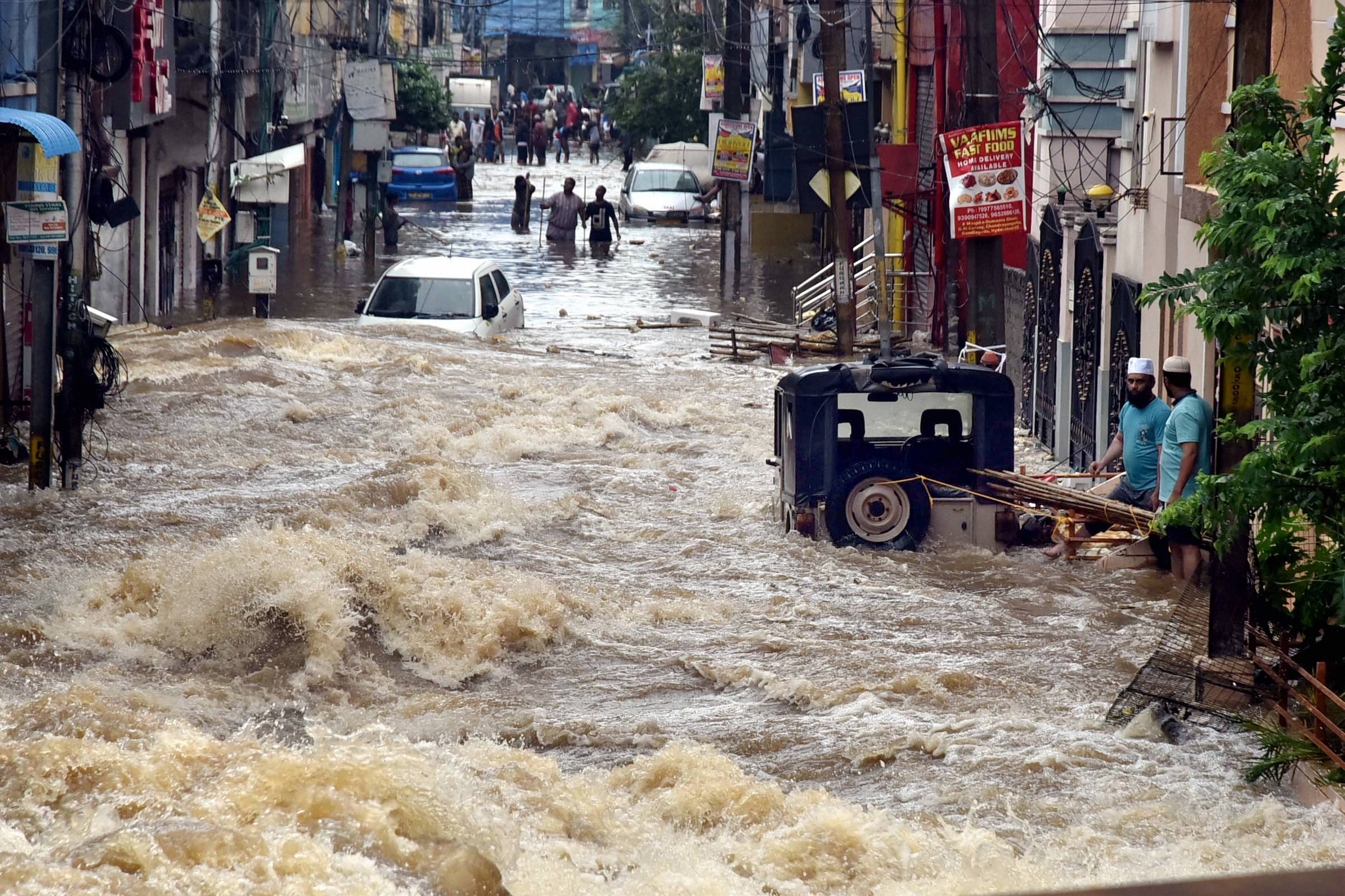 How flooded Hyderabad streets turned cars into 'wrecked boats' HT Auto