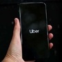 Uber's logo is displayed on a mobile phone. (File Photo) (REUTERS)