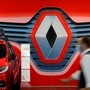 An employee walks past a logo of Renault at a dealership in France. (File photo) (REUTERS)
