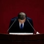 South Korean President Moon Jae-in bows after speaking at the National Assembly in Seoul. (REUTERS)