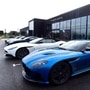 Aston Martin Lagonda cars parked outside the carmaker's new factory in Britain. (File Photo) (REUTERS)