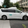 File photo: A Waymo self-driving car pulls into a parking lot at the Google-owned company's headquarters in Mountain View, California. (AFP)