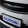 A sign of Alibaba-backed autonomous driving startup AutoX is seen on a modified Chrysler Pacifica minivan in Shenzhen, Guangdong province, China October 31, 2020.  (REUTERS)