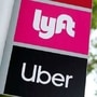 FILE PHOTO: A sign marks a rendezvous location for Lyft and Uber users at San Diego State University in San Diego, California, US (REUTERS)