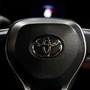The Toyota emblem is seen on the tyre rim of a vehicle. (File photo) (REUTERS)