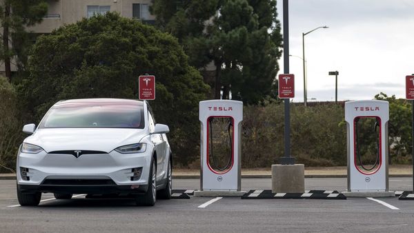 A Tesla electric vehicle at a charging station in California. (File photo) (Bloomberg) A Tesla electric vehicle at a charging station in California. (File photo) (Bloomberg)