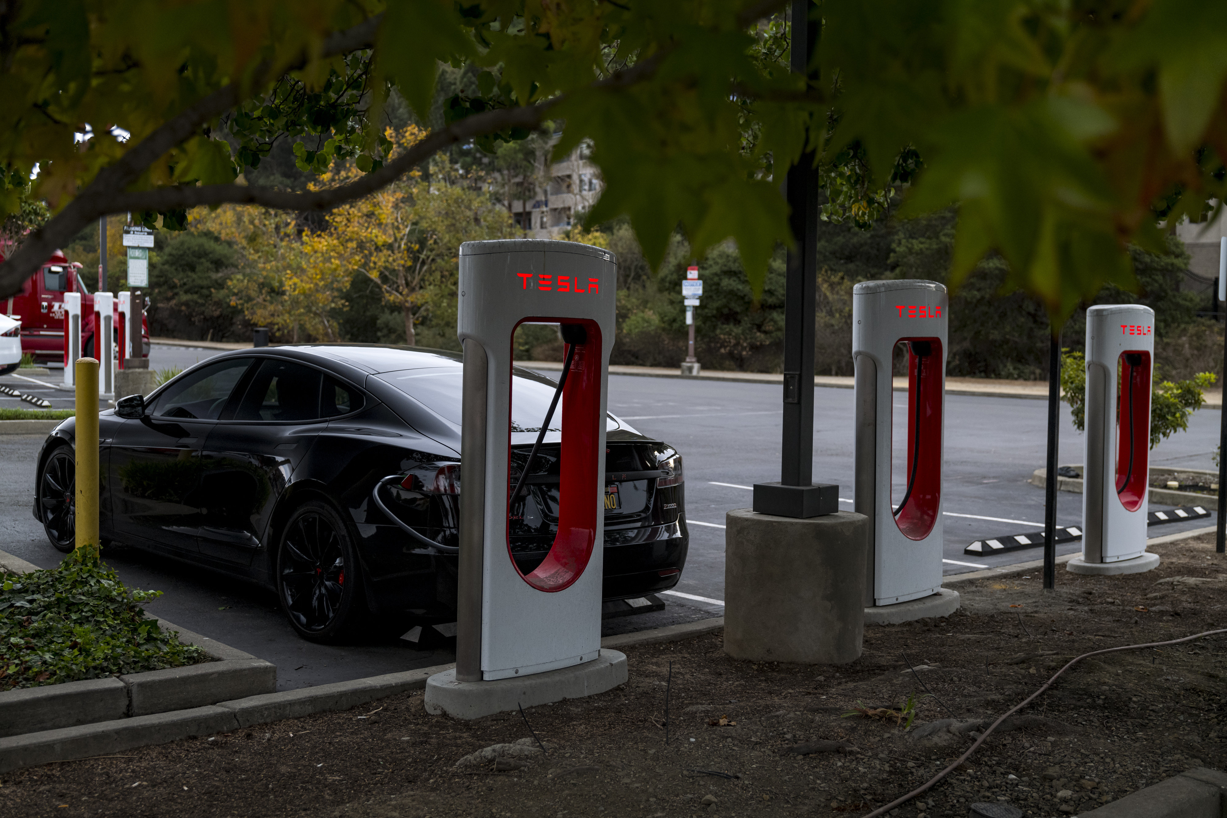 A Tesla Inc. vehicle at a charging station in Richmond, California, US A Tesla Inc. vehicle at a charging station in Richmond, California, US