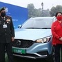 Yash Yadav, Chief Corporate Affairs Officer, MG Motor India, with General Bipin Singh Rawat and MP Meenakshi Lekhi at the flag-off ceremony for the trial run for EVs between Delhi and Agra.