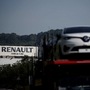 File photo - A car carrier transporting Renault ZOE leaves the Flins plant of French carmaker Renault in Aubergenville, west of Paris. (REUTERS)