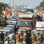 Police stand guard on the Singhu border as farmers march towards Delhi as part of Delhi Chalo protest. (PTI)