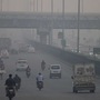 Vehicles moving at Delhi-Gurugram Expressway amid smog, in Gurugram on Thursday. (ANI PHOTO)