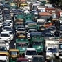 Traffic movement inside the city slowed down on the Delhi carriageways, as the police intensified checking of commuters ahead of the farmers' protest in New Delhi on Thursday.