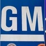 Logos of GM and Ford