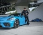 Ottocar J poses with his Boxster Spyder, only on of many Porsche in his garage.