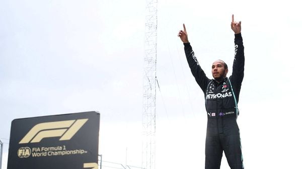 Lewis Hamilton celebrates after winning his seventh Formula One championship. (File Photo) (Pool via REUTERS)
