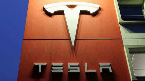 FILE PHOTO: A logo of car manufacturer Tesla is seen at a branch office