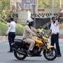 Delhi Traffic Police wearing protective masks monitor road conditions. (Bloomberg)