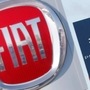 FILE PHOTO: The logos of car manufacturers Fiat and Peugeot  (REUTERS)