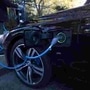 Representational File photo: A driver plugs a cable into a Source power point to charge his electric car. (REUTERS)