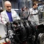 Employees of French carmaker PSA Peugeot Citroen work on the new engine EB assembly line at the company engines factory in Tremery. (File Photo) (REUTERS)