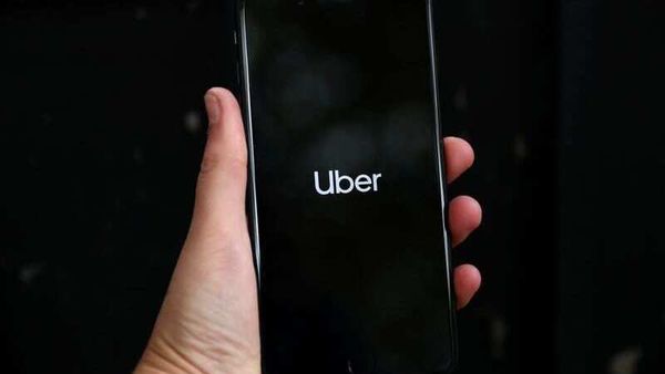 Uber's logo is displayed on a mobile phone. (File Photo) (REUTERS)