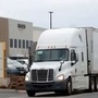 An Amazon truck exits the company's JFK8 distribution center in Staten Island, New York, (REUTERS)
