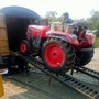 A Mahindra tractor being driven into a railway carriage. (Photo courtesy: Twitter handle of Piyush Goyal)
