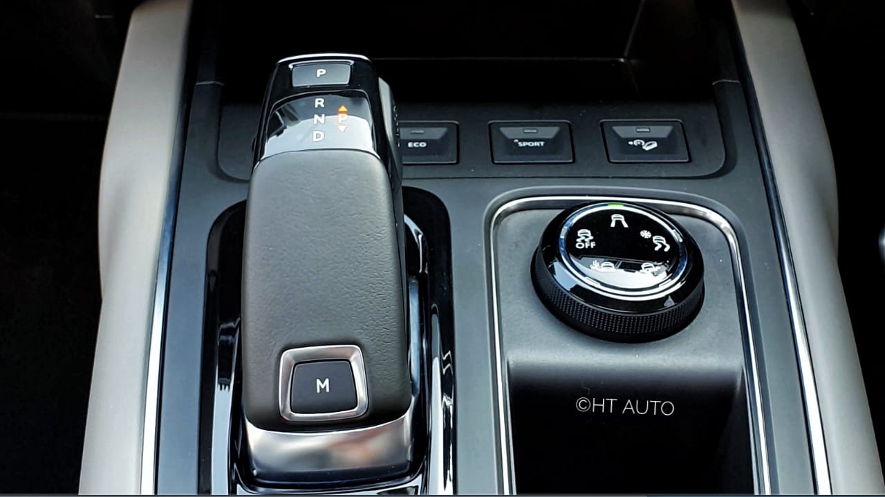 The center console panel is solidly built and has storage space for wireless phone charging, keys, wallet and even houses buttons for Eco and Sport mode selection, apart from terrain modes and traction control dial. (Photo: Sabyasachi Dasgupta/HT Auto)