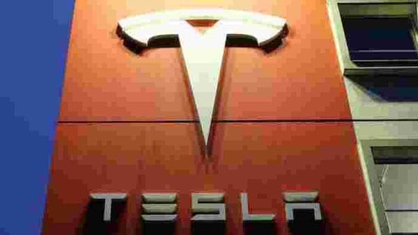  FILE PHOTO: A logo of car manufacturer Tesla is seen at a branch office (REUTERS)