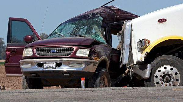 A maroon Ford Expedition which had been crammed with adults and children is seen after it was involved in a deadly collision with a tractor-trailer near Holtville, California, U.S., March 2, 2021. REUTERS/Bing Guan (REUTERS)