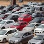 Bengaluru: Members of a Church, adhering to social distancing norms, sing and pray while sitting in their cars after parking them on ground during drive-in worship, amid the ongoing COVID-19 lockdown, in Bengaluru, Sunday, June 14, 2020. (PTI Photo/Shailendra Bhojak)(PTI14-06-2020_000068B) (PTI)