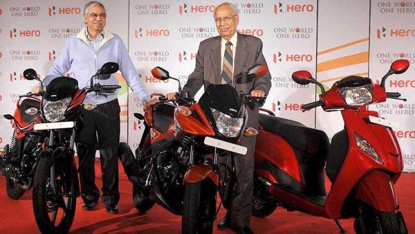 Founder-and-chairman-Hero-Motocrop-Brij-Mohan-Lall-Munjal-R-and-joint-managing-director-Hero-Motocrop-Sunil-Kant-Munjal-pose-with-newly-launched-110cc-passion-Xpro-and-125-cc-bike-Ignitor-day-before-Auto-Expo-begins-in-New-Delhi-AFP-Photo-Sajjad-Hussain Founder-and-chairman-Hero-Motocrop-Brij-Mohan-Lall-Munjal-R-and-joint-managing-director-Hero-Motocrop-Sunil-Kant-Munjal-pose-with-newly-launched-110cc-passion-Xpro-and-125-cc-bike-Ignitor-day-before-Auto-Expo-begins-in-New-Delhi-AFP-Photo-Sajjad-Hussain