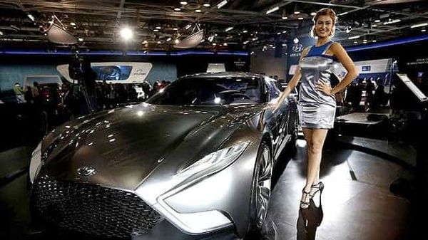 A model stands next to a Hyundai HND-9 Venace concept car during the Indian Auto Expo in Greater Noida. (Reuters) Five best looking concept cars at the India Auto Expo