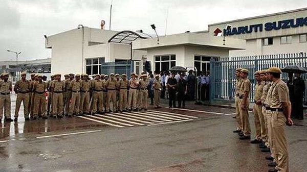 Maruti Suzuki factory at Manesar reopened with tightened security, after a riot by workers last month killed one person and injured dozens of others. AP Photo/Manish Swarup Maruti Suzuki factory at Manesar reopened with tightened security, after a riot by workers last month killed one person and injured dozens of others. AP Photo/Manish Swarup