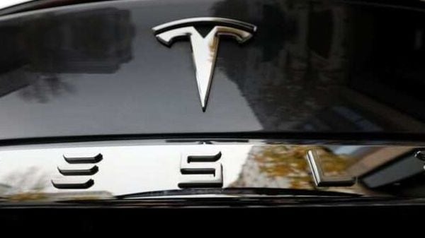 FILE PHOTO: The company logo is pictured on a Tesla Model X electric car in Berlin, Germany. (REUTERS)