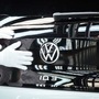 Factory employee working on a Volkswagen ID.3 car