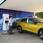An employee presents the new electric Volkswagen model ID. 4 during a media show in Zwickau, Germany. (File Photo) (REUTERS)