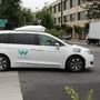 A Waymo self-driving car pulls into a parking lot at the Google-owned company's headquarters in Mountain View, California. (AFP)