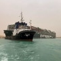 A container ship which was hit by strong wind and ran aground is pictured in Suez Canal, Egypt. (VIA REUTERS)