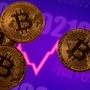 File photo - A representation of virtual currency Bitcoin is seen in front of a stock graph. (REUTERS)