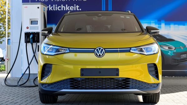 A Volkswagen ID. 4 electric vehicle is shown recharging at a EV charging station. (File Photo) (REUTERS)