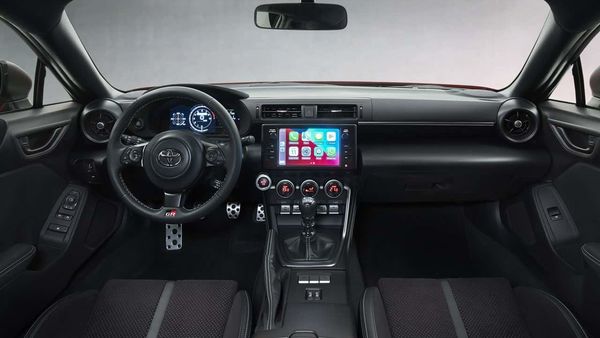 The interior of the Toyota GR86 boasts of a seven-inch digital instrument panel and an 8-inch touchscreen infotainment system.