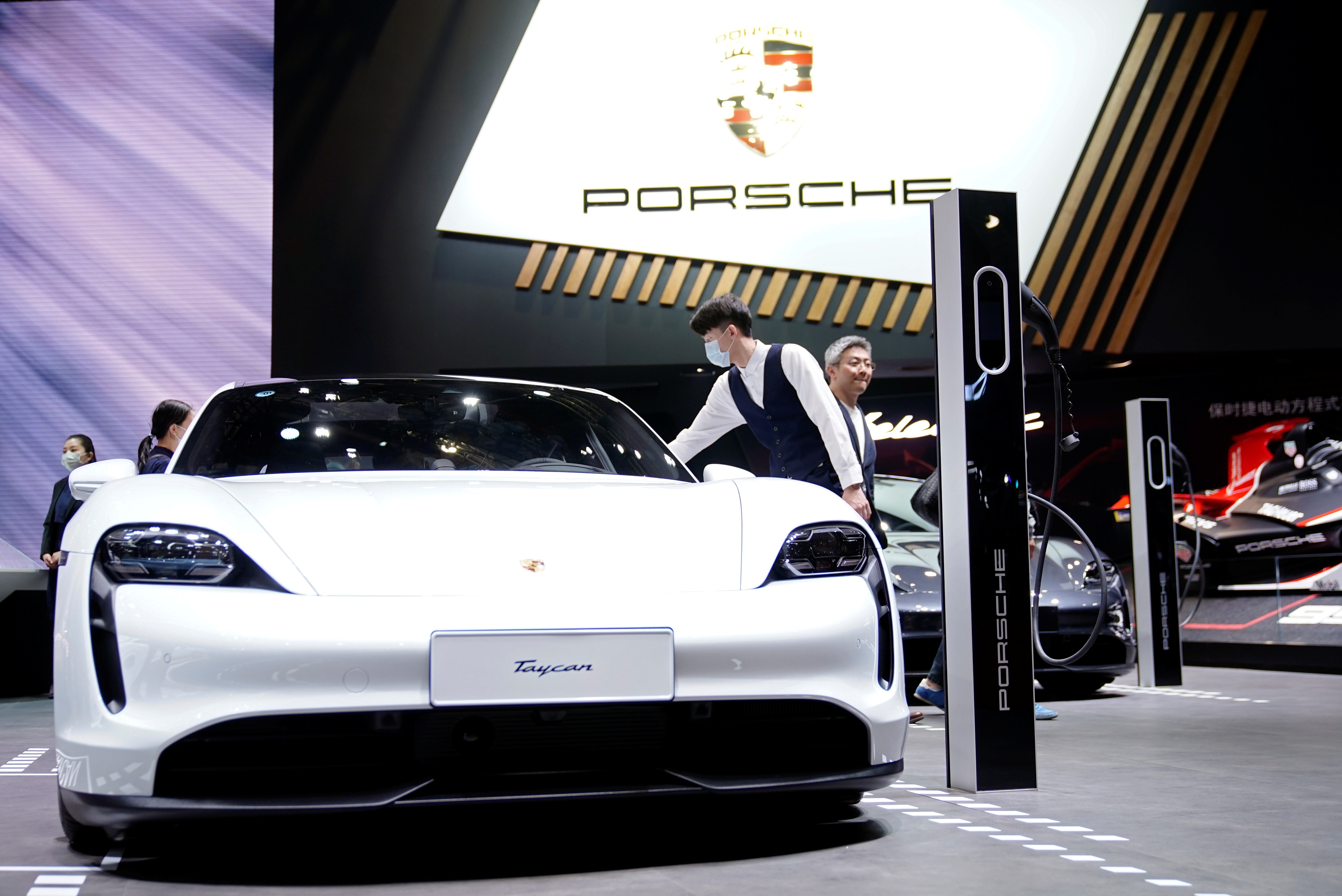 A Porsche Taycan electric vehicle (EV) displayed in the Auto Shanghai show in Shanghai, (Picture credit: Reuters)
