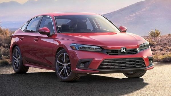 2022 Honda Civic Sedan has been unveiled with new styling, more powerful VTEC Turbo engine and more.