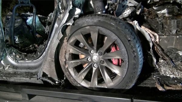 The remains of the Tesla Model S after it crashed. (via REUTERS)