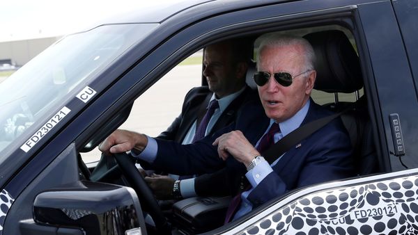 US President Joe Biden tests the new Ford F-150 lightning truck as he visits VDAB at Ford Dearborn Development Center in Dearborn, Michigan, US, May 18, 2021. (REUTERS)