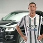 Cristiano Ronaldo, ace striker in the Juventus team, poses with the new Jeep 4xe logo on the uniform.