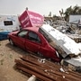 Damaged vehicles are seen here after Cyclone Tauktae created havoc in several western states in India. (MINT_PRINT)