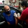 The new drive-through vaccination facility is located at the Multilevel parking of Gaur City Mall in Noida.  (Anshuman Poyrekar/HT PHOTO)